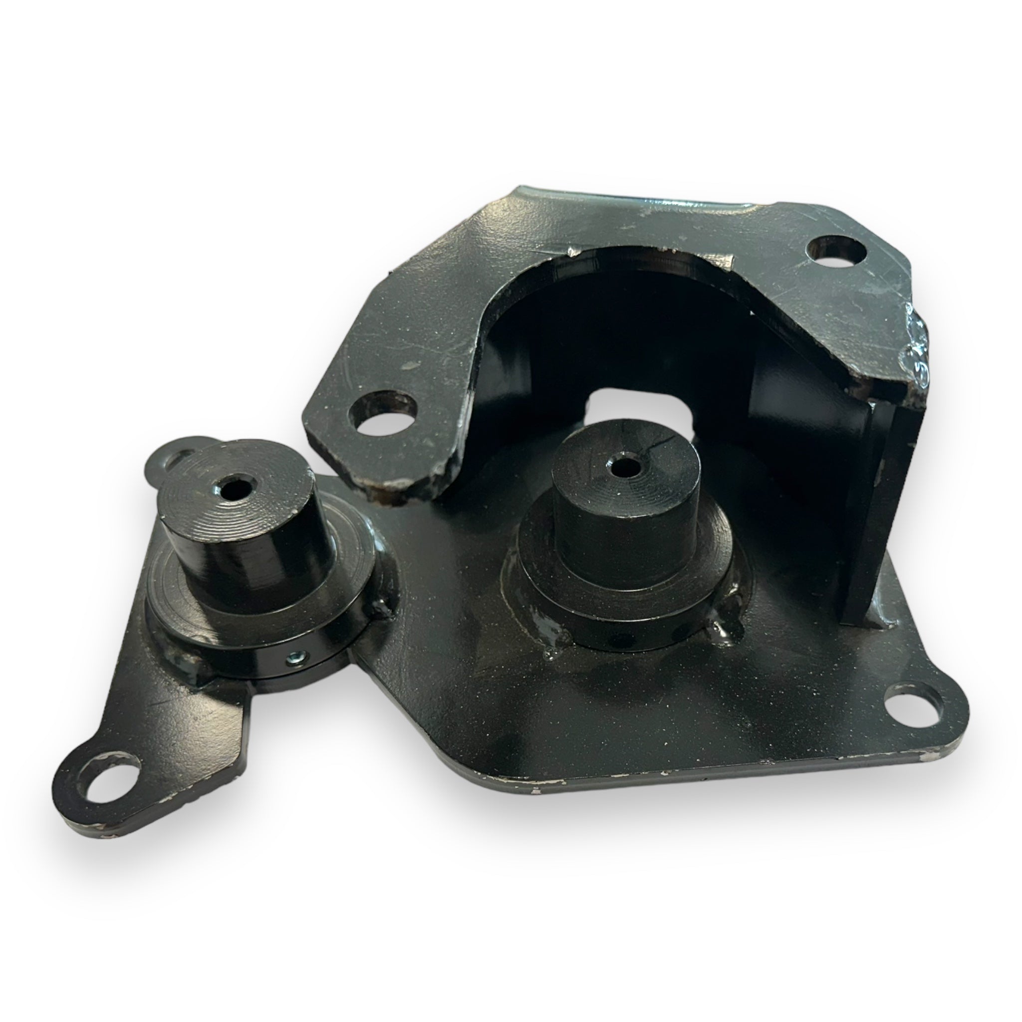 Mounting Bracket Hydro Motor VERTICAL for Dhollandia Tail Lifts, featuring a black metal piece with holes for secure attachment, essential in commercial trailer maintenance.