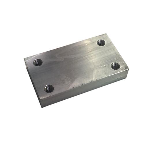 Retaining Block (KB) for Ratcliff Palfinger Tail Lifts, featuring a metal plate with screws, essential for commercial trailer maintenance from Nationwide Trailer Parts Ltd.