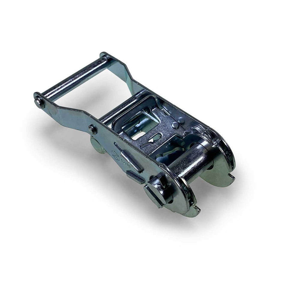 1500kg Ratchet Buckle (25mm) - Wide Handle, shown with its robust metal strap and powerful ratchet tensioner, suitable for securing loads on large commercial trailers.