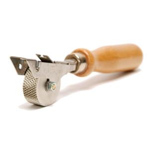 9mm Customs Seal Pressure Roller with a wooden handle and steel embossed wheel, designed for applying security tape on curtainsided vehicles during customs inspections.