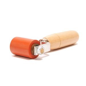 40mm Single Arm Silicone Pressure Roller with wooden handle, designed for smooth, consistent pressure on welding materials, suitable for commercial trailer and vehicle maintenance.